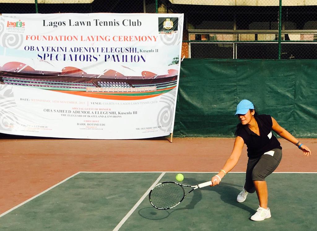 Ushna Suhail hitting a tennis shot