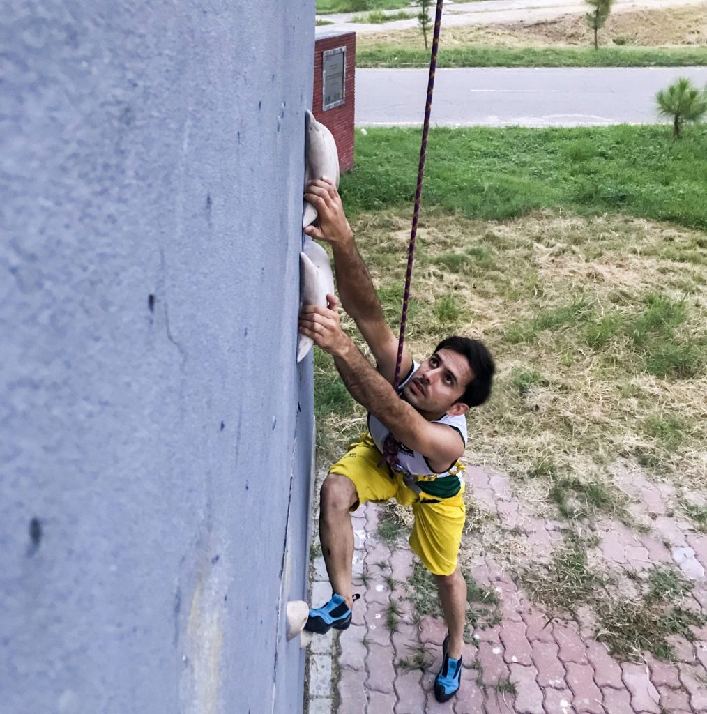Zahir Ahmad eyes the top as he speed climbs a wall 