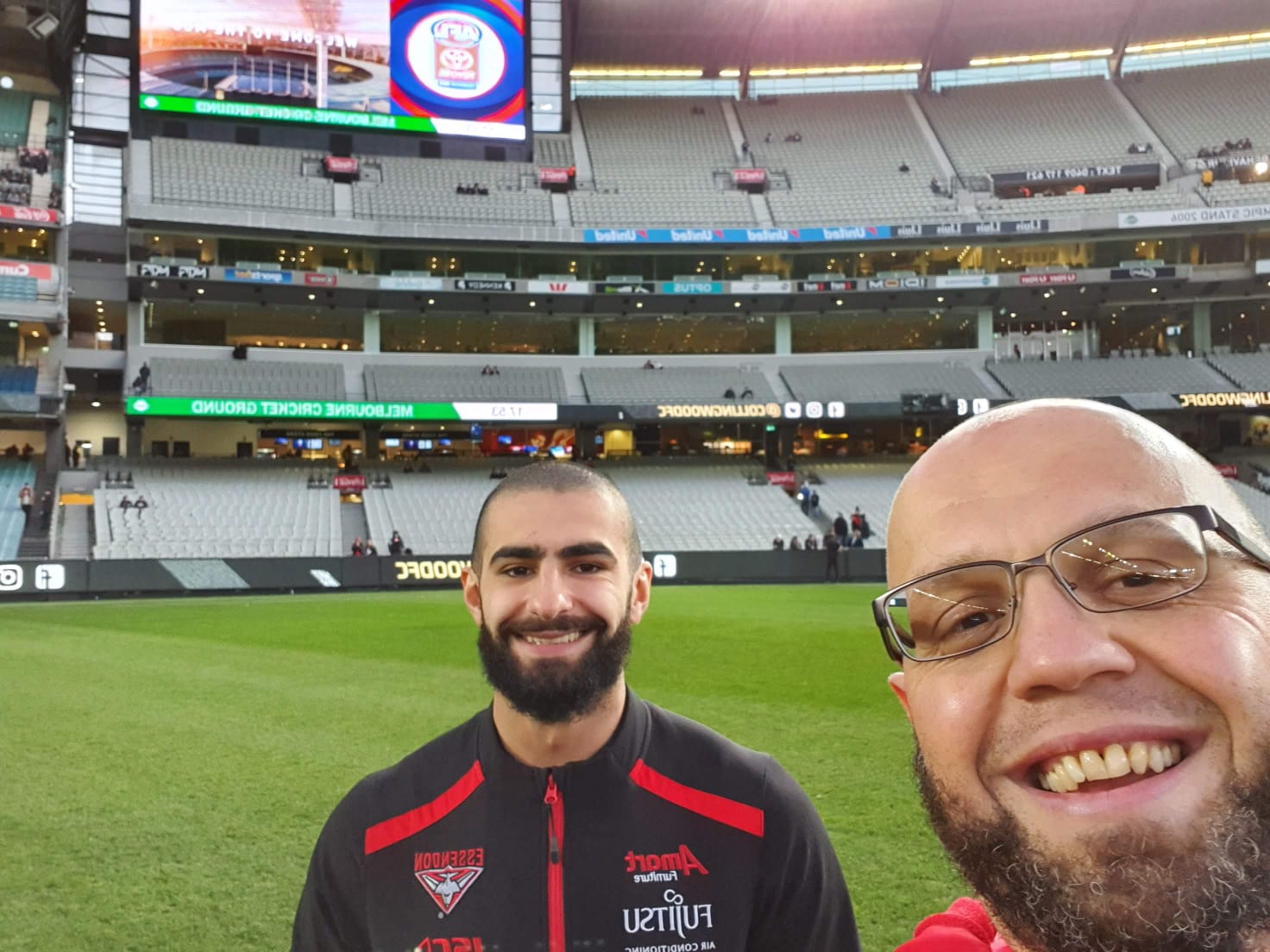 Wassim Rafihi with Adam Saad, AFL star at the stadium