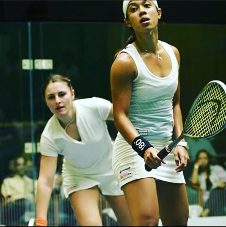 Carla Khan faces off against Nicol David in the squash court