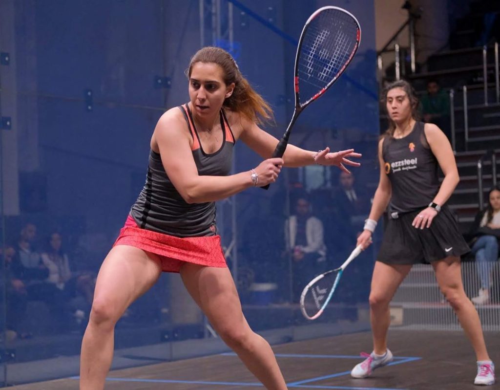 Nadine Shahin hitting the squash ball (Egypt player)