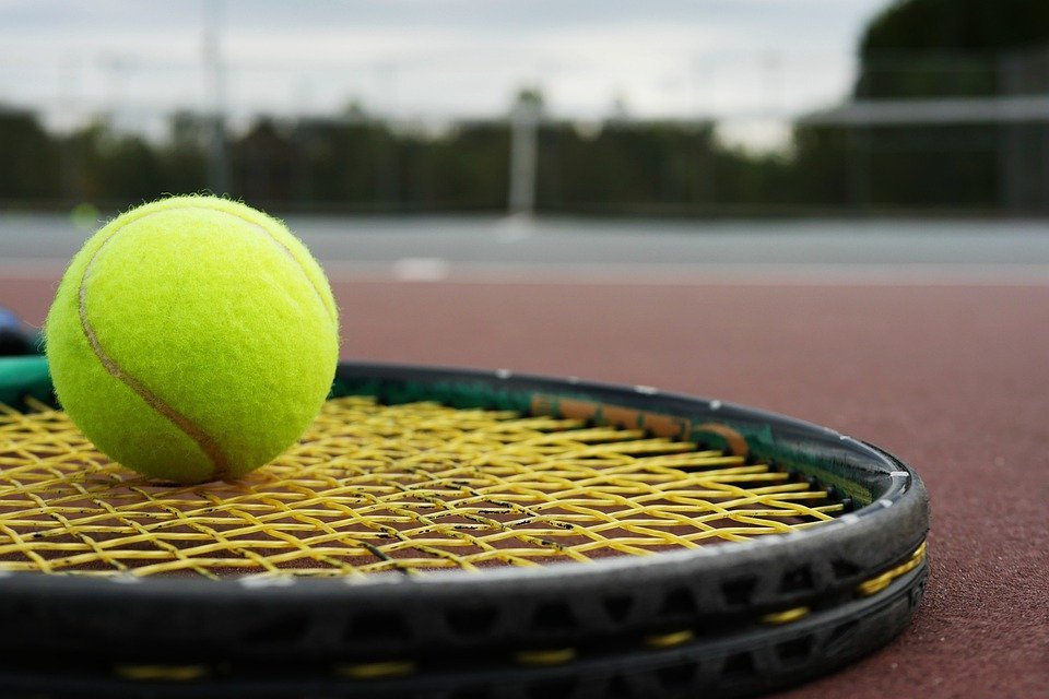 racket with ball