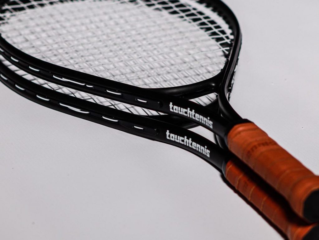 TouchTennis racket in black and red color