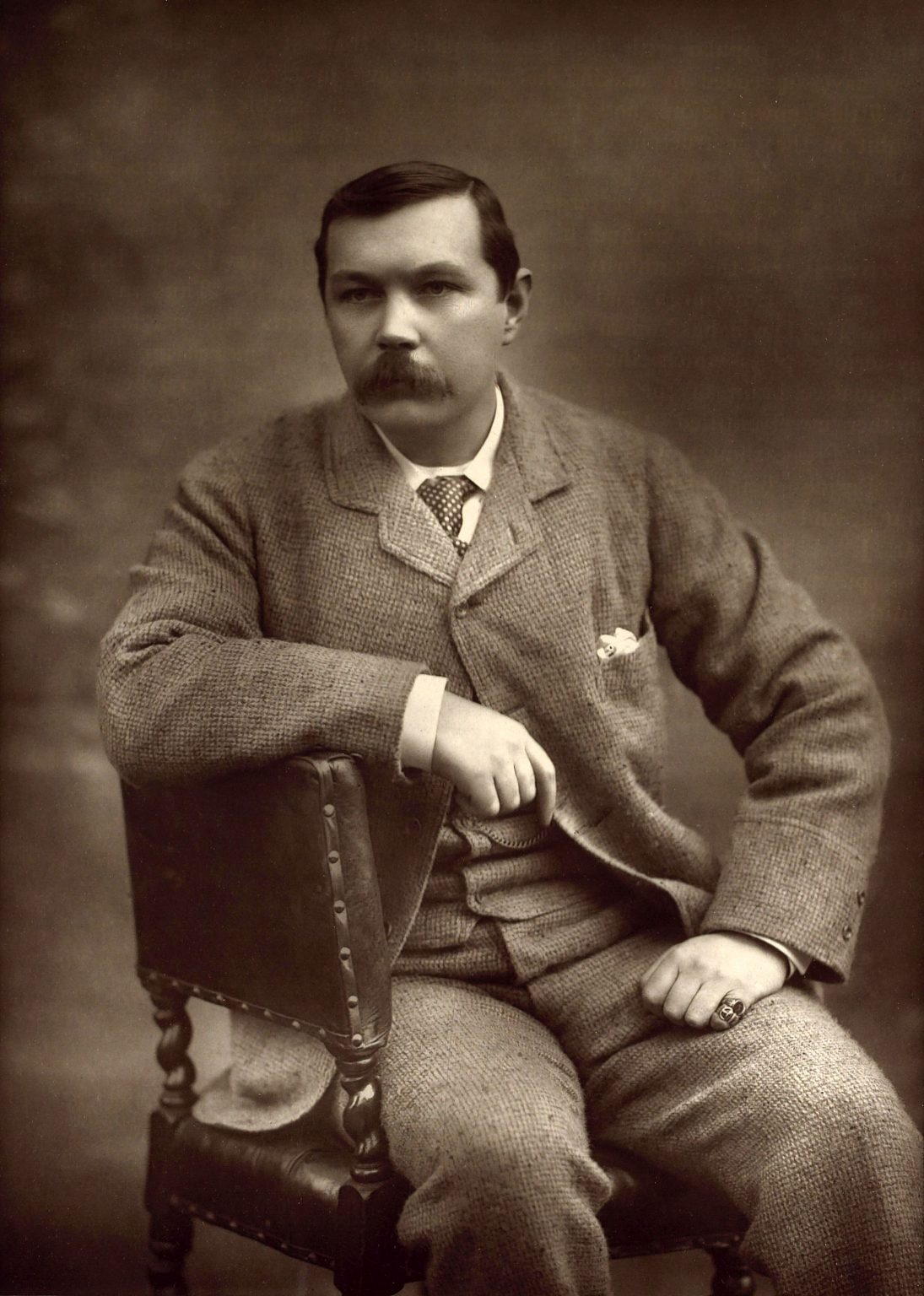 Arthur Conan Doyle poses for a picture