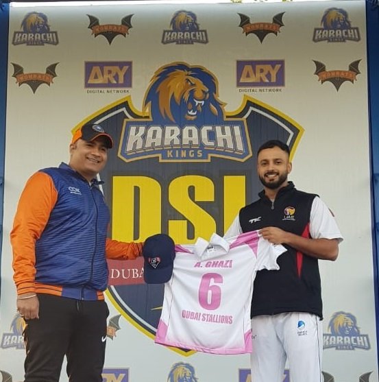 Abdullah Ghazi receives his cricket shirt for the Dubai Stallions for a game in the UAE