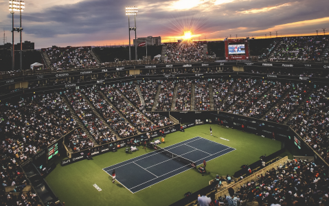 Tennis court with fans