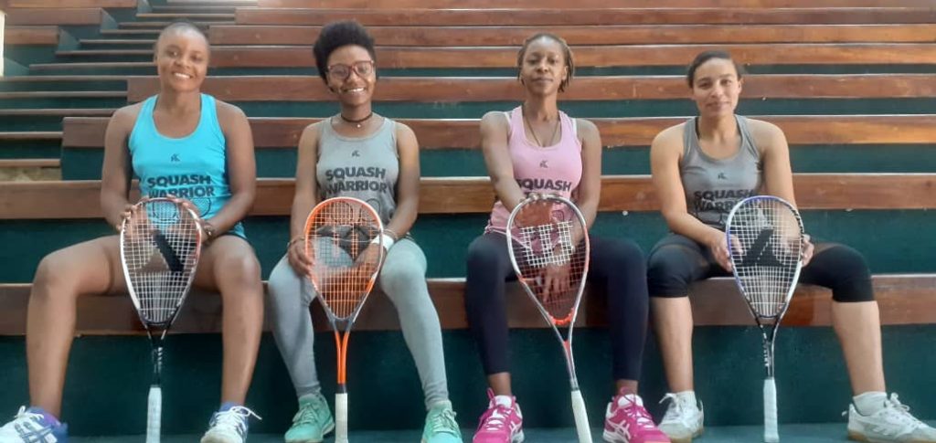 Four girls pose for Simply Squash.