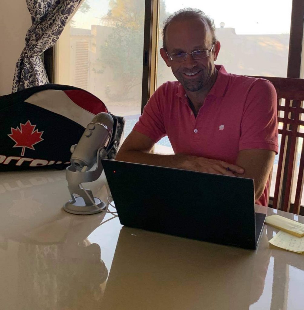 Gerry Gibson on is laptop (In Squash Podcast)